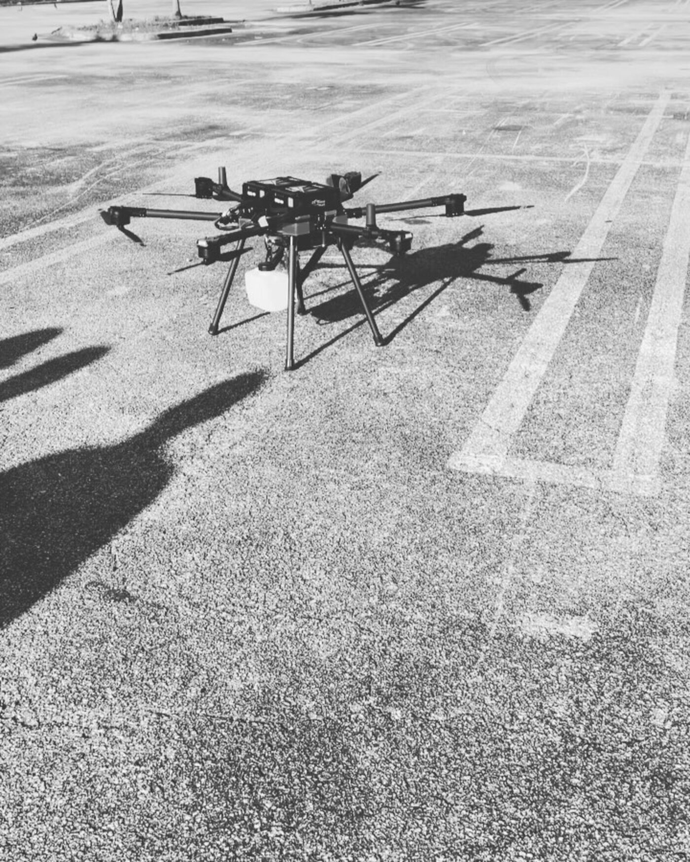 Drone on the tarmac, black and white